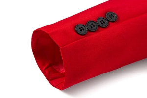 Close-up of red slim fit blazer cuff with four black buttons and high-density twill fabric
