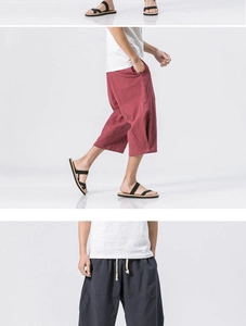 Detail view of linen cropped pants with drawstring waist and deep side pockets