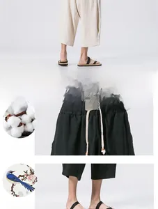 Close-up of linen drawstring waistband and wide leg cuff on casual summer pants