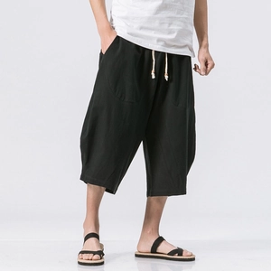 Men's loose linen cropped pants in black with drawstring waist for summer leisure wear