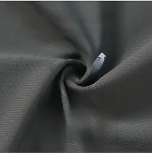 Detailed macro view of gray ice silk fabric texture with cooling and breathable properties