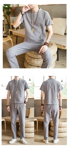 Detail of men's linen set showing gray mandarin collar shirt and drawstring trousers