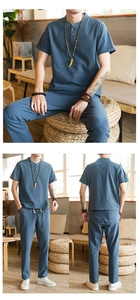 Detail view of men's grey-blue cotton linen set with Henley neck shirt and jogger pants