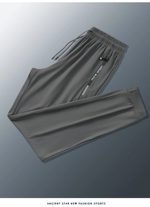 Detail of ice silk fabric men's joggers with elastic waist and zipped pocket