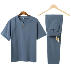 Men's cotton linen two-piece set in haze blue featuring a Henley neck and drawstring pants