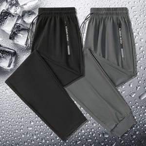 Black and grey ice silk men's joggers with drawstring waist and zip pockets