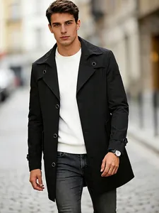 Classic black single-breasted mid-length trench coat for men in a stylish city street setting