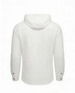 Detail view of white hooded shirt jacket featuring fine ribbed texture and buttoned cuffs