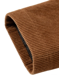 Detail of premium brown corduroy sleeve cuff with neat stitching and smooth black lining