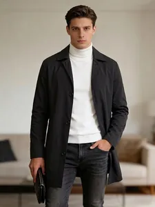 Classic black single-breasted trench coat with white turtleneck and grey slim jeans