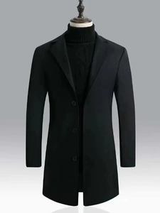 Detailed close-up of a men's black mid-length wool coat with classic three-button closure