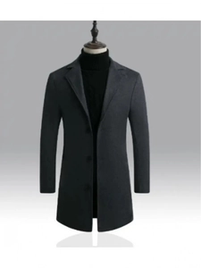 Detailed view of dark charcoal grey wool coat lapels and button closure on mannequin
