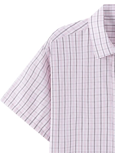 Detailed macro view of the light pink plaid texture and stitching on short sleeve shirt