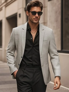 Men's casual light grey linen suit jacket with notched lapels in urban street setting