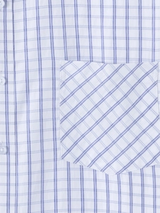 Close-up of men's blue plaid shirt showing chest pocket with diagonal pattern and white buttons