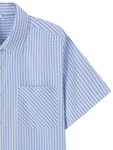 Macro detail of blue and white striped men's shirt showing diagonal pocket and buttons