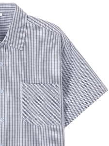 Detail of men's striped summer shirt showing diagonal pocket stripes and white buttons