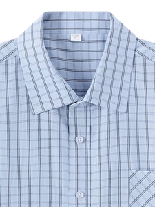 Detail of light blue plaid shirt collar and buttons with high-quality cross-weave fabric