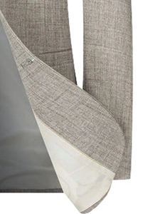 Gros plan détaillé d'une veste grise pour hommes avec texture tissée et doublure soignée
