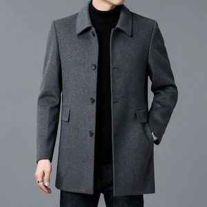 Detail view of dark grey wool blend coat featuring classic lapels and four-button closure