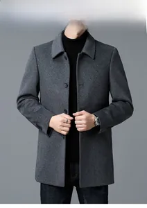 Detail of single-breasted lapel on dark grey wool coat with premium wool texture