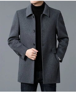 Detail of grey men's wool coat showing fine textured fabric and classic notched lapels