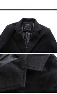 Detail view of fashion collar label and high-quality wool fabric texture on men's black coat