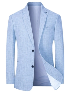 Close-up of light blue men's blazer featuring textured fabric and classic notch lapel