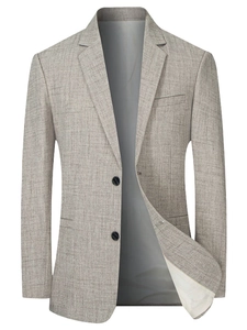 Close-up of khaki linen texture on notched lapel of men's casual slim blazer