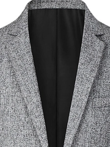 Close-up of men's slim-fit blazer showing textured grey weave fabric and notched lapel