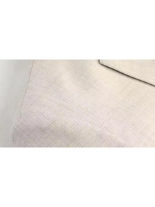 Macro shot of beige woven fabric texture with subtle crosshatch pattern for men blazer