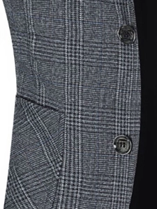 Détail du motif à carreaux subtil et des boutons sur cette veste de costume pour homme