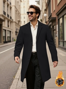 Men's wool blend overcoat in black featuring thick quilted lining and notched lapel