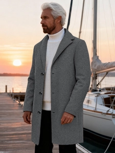 Men's mid-length grey business casual wool coat with single-breasted design at sunset dock