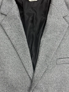 Giacca da uomo in tweed a spina di pesce grigio con revers classico e fodera interna morbida