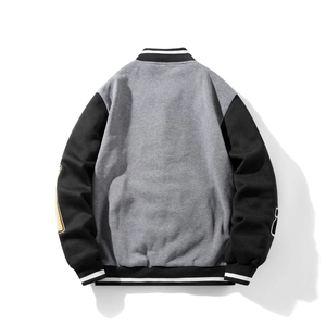 Rear view of grey and black varsity jacket with embroidery and striped ribbed cuffs