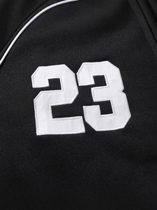 Black hooded knit baseball jacket with white embroidered number 23 and mesh fabric texture