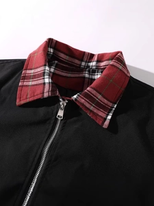 Men's casual black jacket featuring a classic plaid collar detail and metal zipper