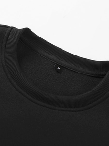Detail of ribbed crew neck and fleece lining on black spring sweatshirt size M