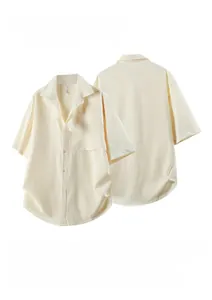 Detail view of the textured summer short-sleeved shirt fabric in cream white color