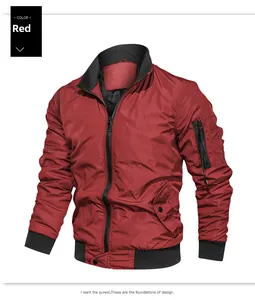 Detail of red men's bomber jacket with black ribbed collar and sleeve zipper pocket