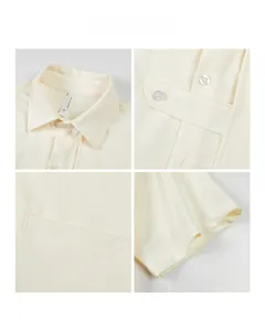 Detail of beige textured fabric, collar and button placket of the casual short sleeve shirt