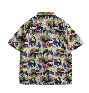 Back view of a men's shirt featuring colorful abstract graffiti prints and lapel collar