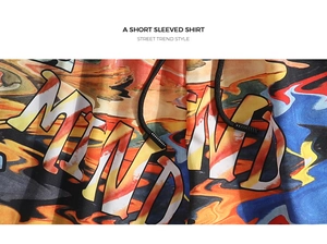 Close-up of street trend style printed shorts with colorful graffiti and adjustable drawstring