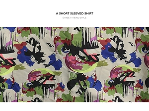 Close-up of abstract graffiti print on breathable street style short sleeve shirt fabric