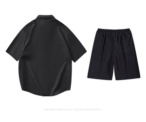 Détail de l'ensemble d'été noir montrant la texture du tissu et la poche