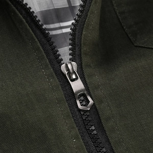 Close-up of heavy cotton twill jacket with zipper and retro plaid cotton lining