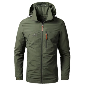 Detail of army green outdoor jacket featuring chest logo and vertical zipper pocket