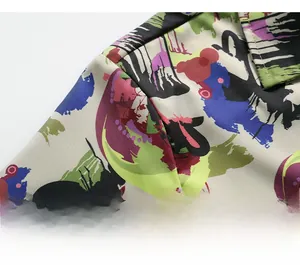 Macro shot of heavy-duty shoulder stitching on men's ice-feel graffiti print shirt