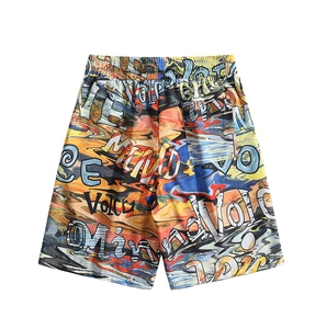 Detail of multi-color graffiti beach shorts featuring elastic waistband and back pocket